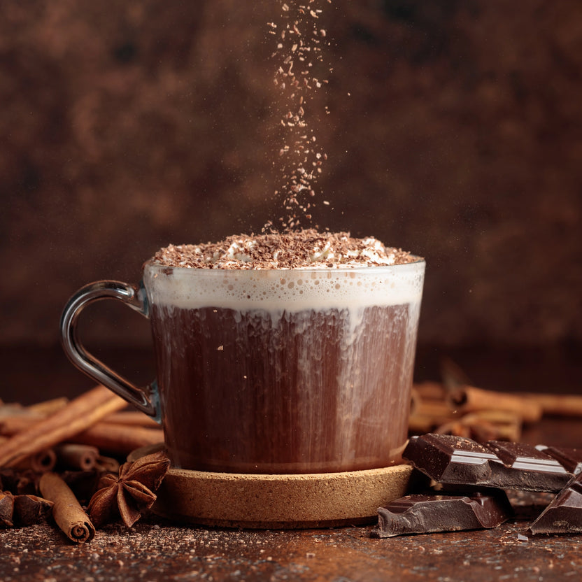 Mixing hot chocolate powder into a smooth paste